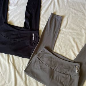 Two pairs of Gymshark capri leggings.